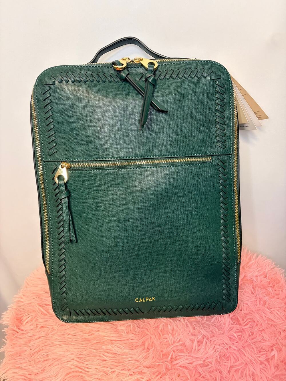 Calpak 15 inch Laptop Backpack in Emerald.
NWT.